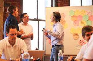 People having meeting sharing career ideas